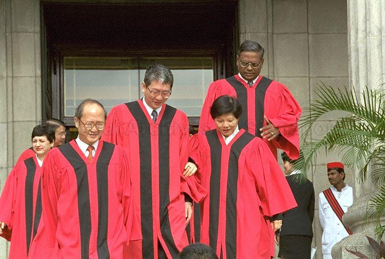 Judges and Judicial Commissioners assembling at outside City Hall for group photo during Opening of Legal Year 1999. From left, Justice Kan Ting Chiu, Justice Tan Lee Meng and Justice Lai Siu Chiu, Justice Tan Lee Meng, Justice Lai Siu Chiu and Justice S Rajendran. In the background on the left is Justice Judith Prakash
