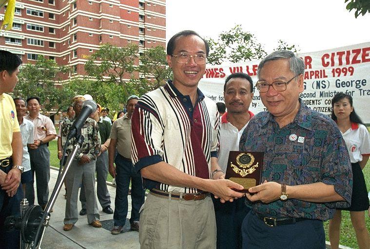 Minister for Information and the Arts and Second Minister for Trade and Industry Brigadier-General George Yeo Yong-Boon (left) presenting plaque to Chairman of Thye Hua Kwan Moral Society (THKMS) Lee Kim Siang during Minister's community visit to Tampines Central Division of Tampines Group Representation Constituency