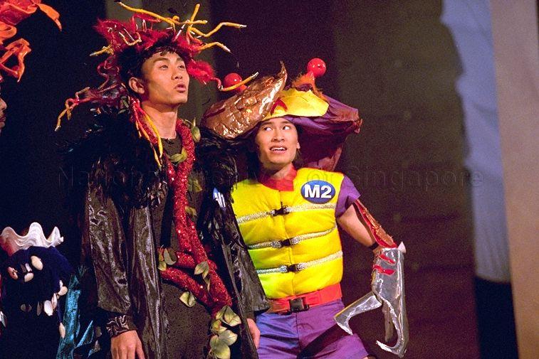 Taiwanese Jeff Wang (left), the male champion of Television Corporation of Singapore (TCS) All Asian Star Search, portraying as Ambassador Crab in a musical segment during TCS Star Search grand final at TCS TV Centre, Caldecott Broadcast Centre. Guest of honour at the event was Minister for Information and the Arts and Second Minister for Trade and Industry Brigadier-General George Yeo Yong-Boon.