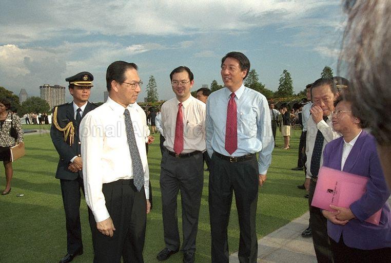 President Ong Teng Cheong (first from left), Permanent Secretary, Ministry of Education Chiang Chie Foo (second from left) and Minister for Education and Second Minister for Defence Rear Admiral Teo Chee Hean (third from left) talking to guests at Teachers' Day Reception at Istana Front Lawn