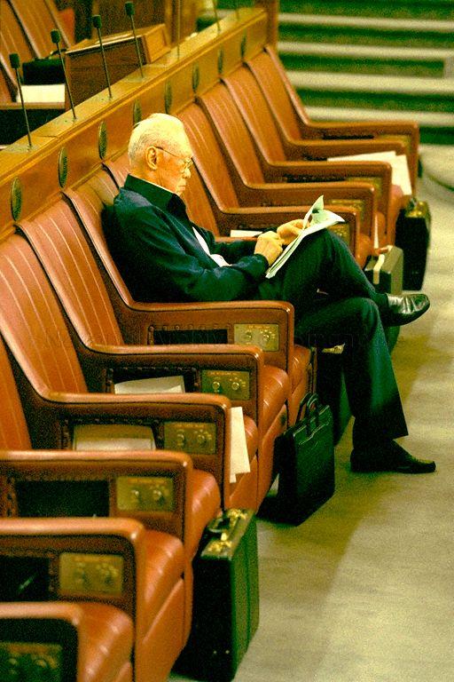 Senior Minister Lee Kuan Yew at his seat during a Parliamentary sitting at the Old Parliament House (currently The Arts House) chamber