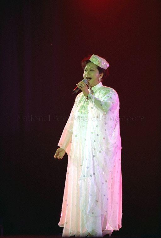 Hong Kong star Nancy Sit performing a song at MediaCorp All-Star Charity dinner and show at Harbour Pavilion, World Trade Centre. The fundraising event was attended by Minister for Information and the Arts and Minister for the Environment Lee Yock Suan.