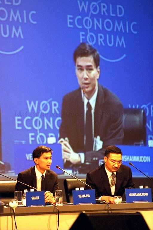Mr Abhisit Vejjajiva (left) of Thailand speaking at closing plenary session of World Economic Forum (WEF)'s East Asia Economic Summit 1999 held in Singapore International Convention and Exhibition Centre (SICEC) Ballroom. Next to him is panel member Dato Seri Hishammuddin bin Tun Hussein of Malaysia.