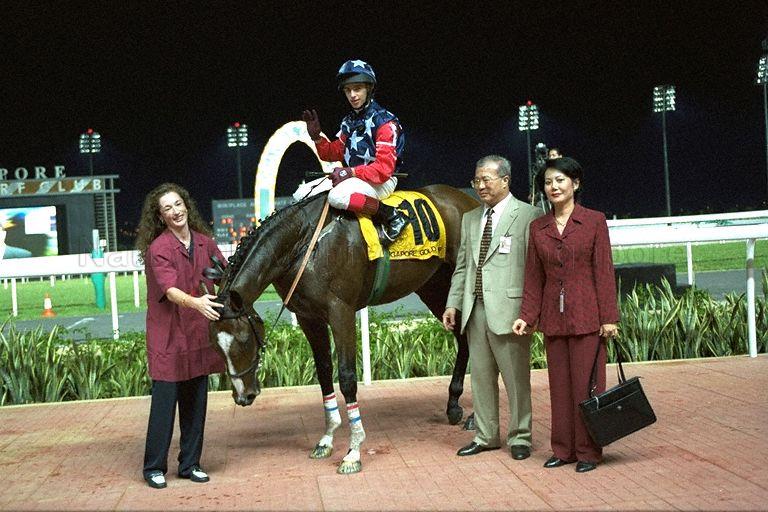 Carry the Flag, winning horse of Singapore Gold Cup 1999 at the Singapore Race Course, Singapore Turf Club, 1 Turf Club Avenue. Jockey is Brett Doyle. Prime Minister Goh Chok Tong and Mrs Goh are guests of honour at this event.