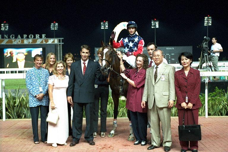 Carry the Flag, winning horse of Singapore Gold Cup 1999 at the Singapore Race Course, Singapore Turf Club, 1 Turf Club Avenue. Jockey is Brett Doyle. Prime Minister Goh Chok Tong and Mrs Goh are guests of honour at this event.