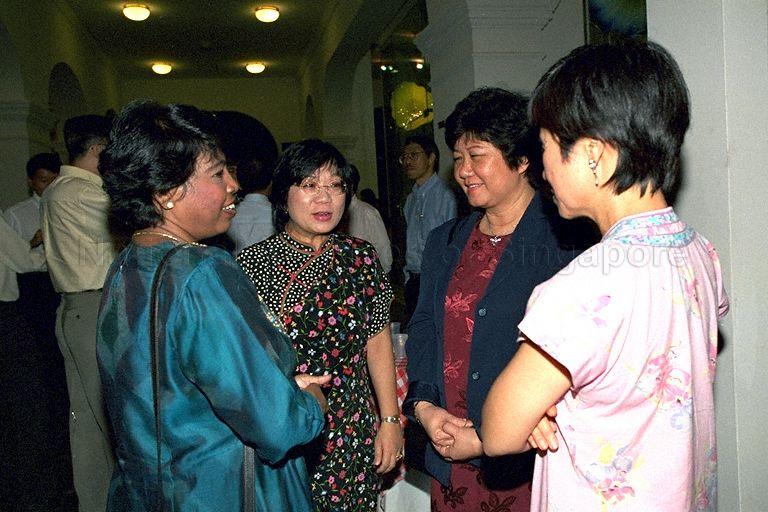 Mrs Jennifer Yeo (second from left), wife of Second Minister for Trade and Industry and outgoing Minister for Information and the Arts in conversation with guests during farewell dinner for the Minister held at Glass Hall, Singapore Art Museum