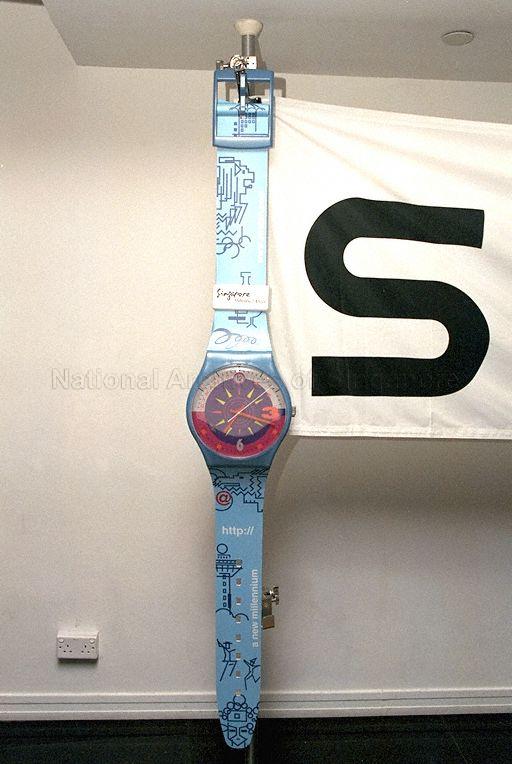 One of the two models of specially designed Swatch watch featuring landmarks such as Changi Airport's control tower and the Merlion on display at Wheelock Place, Orchard Road, during launch of Youth and Environment Support (YES) 2000 programme. Guest of honour at the event was Minister for Trade and Industry Brigadier-General George Yeo Yong-Boon.