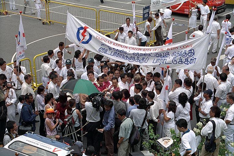 Taken at: Nomination Day for General Elections 2001 at Kent Ridge Secondary School Nomination Centre Pictured: People's Action Party (PAP) candidates for West Coast Group Representation Constituency (GRC) Foo Chee Keng Cedric, Lim Hng Kiang, and S Iswaran
