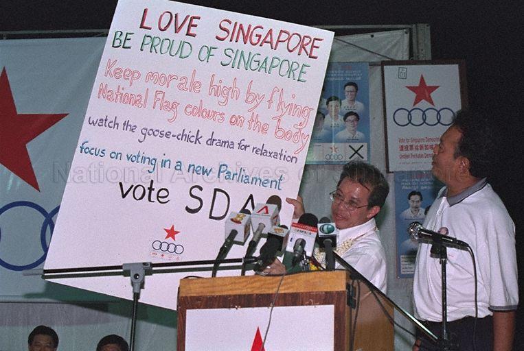 Taken at: Singapore Democratic Alliance (SDA) rally for the 2001 General Election at the open field between Kallang Avenue and Lavender Street opposite Block 19 Kallang Avenue Industrial Estate Pictured: SDA candidate for Bukit Timah Single Member Constituency (SMC) Tong Meng Chye
