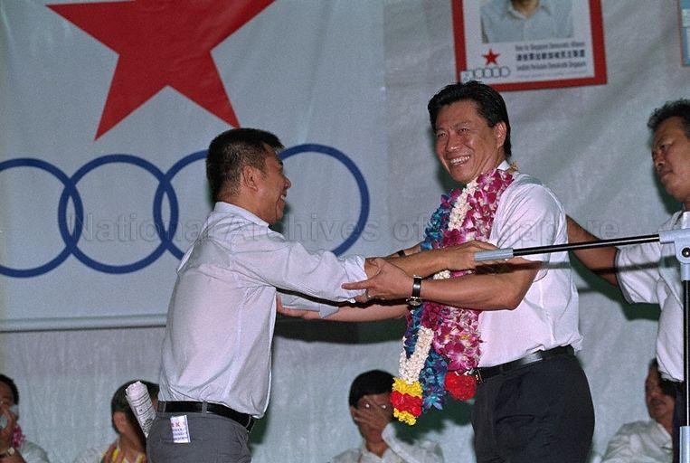 Taken at: Singapore Democratic Alliance (SDA) rally for the 2001 General Election at the open field between Kallang Avenue and Lavender Street opposite Block 19 Kallang Avenue Industrial Estate