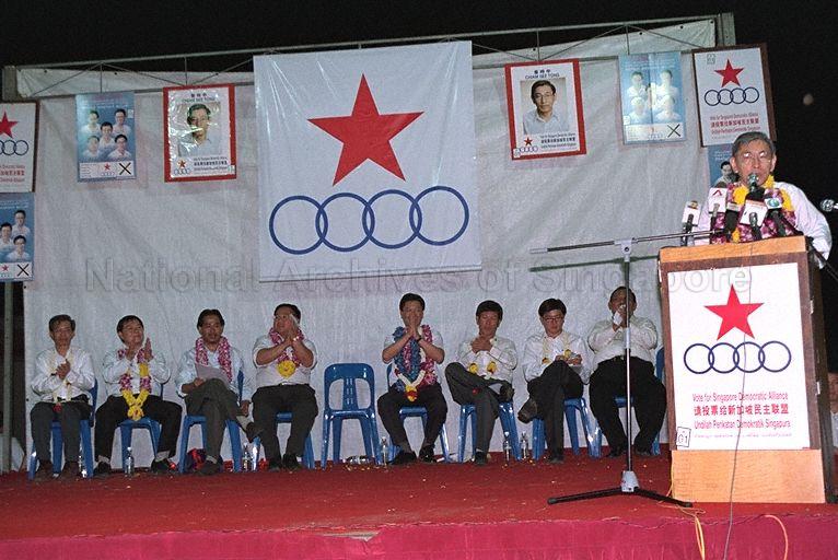 Taken at: Singapore Democratic Alliance (SDA) rally for the 2001 General Election at the open field between Kallang Avenue and Lavender Street opposite Block 19 Kallang Avenue Industrial Estate Pictured: SDA candidate for Potong Pasir Single Member Constituency (SMC) Chiam See Tong, SDA candidate for Bukit Timah SMC Tong Meng Chye and SDA candidates for Jalan Besar GRC Fong Chin Leong, Lim Bak Chuan, Mohd Rahizan Bin Ya'acob and Sin Kek Tong
