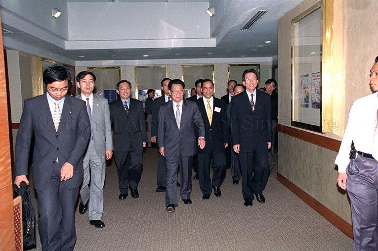 Taken at: Visit by Chairman of the Committee of the Chinese People's Political Consultative Conference (CPPCC) National Committee Li Ruihuan to Singapore - Visit to Ulu Pandan Community Club at Ghim Moh Road Pictured: Minister of State for Communications and Information Technology and National Development Dr John Chen, Acting Minister for the Environment, Minister of State for Trade and Industry, and Communications and Information Technology Lim Swee Say and Chairman of the CPPCC National Committee Li Ruihuan