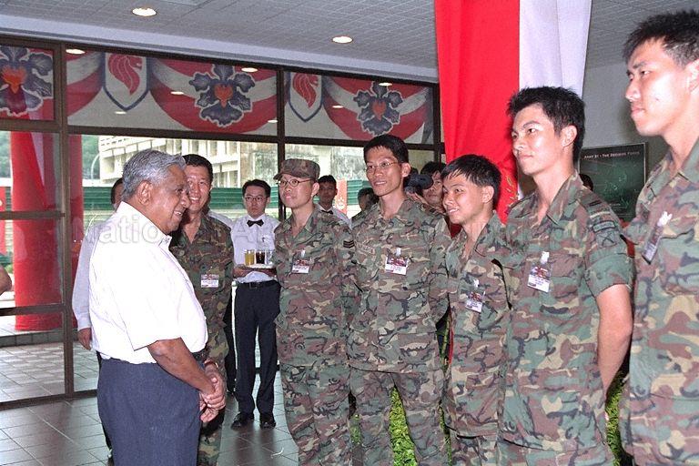 President S R Nathan talking with army personnel after the live-firing demonstration by National Servicemen from the 634th Battalion, Singapore Guards and 433rd Battalion, Singapore Armoured Regiment during the President's visit to Pasir Laba Camp in Upper Jurong
