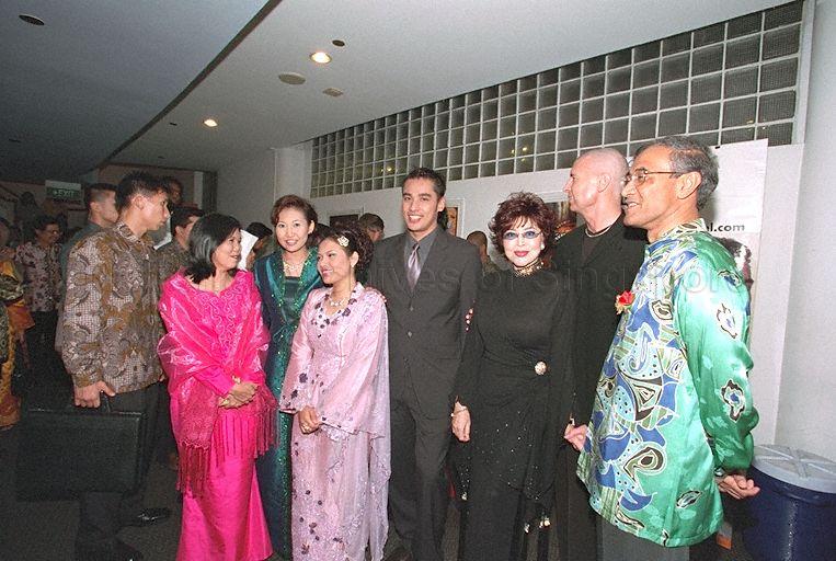 Group photo of singer Anita Sarawak (third from right), her husband (second from right), Mayor of North East Community Development Council Zainul Abidin Rasheed (right) and other guests taken at Tabung Amal Aidilfitri Closing Ceremony at TV Theatre in MediaCorp Caldecott Broadcast Centre also attended by Guest-of-Honour Prime Minister Goh Chok Tong