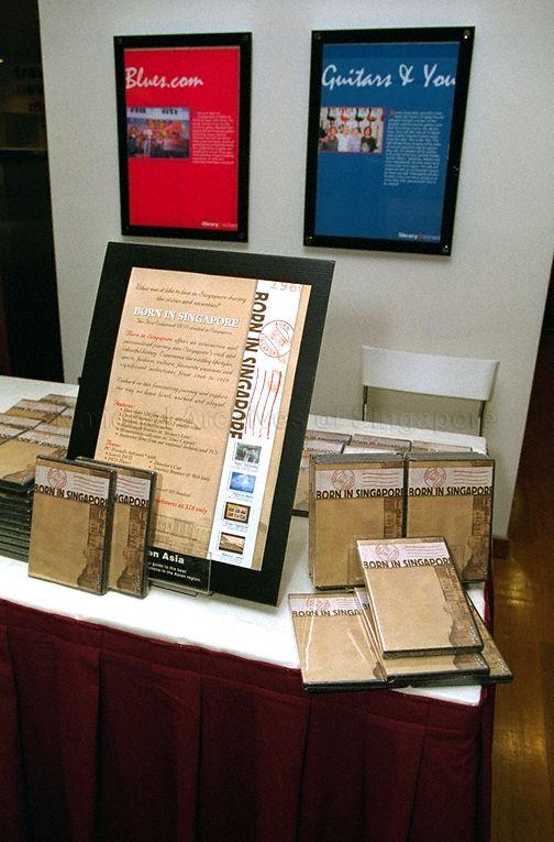 "Born in Singapore" National Education DVDs on display at launch event for the DVD at Library@Orchard, Ngee Ann City, 391 Orchard Road. Senior Parliamentary Secretary, Ministry of Infomation and the Arts Yatiman Yusof gave an address at this event.