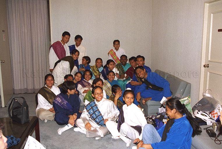 Dikir barat (traditional Malay vocal musical form characterised by synchronised hand and body movements) performers before their presentation at Gongxi Raya Celebration at Government Press Centre, Ministry of Information and the Arts, Port of Singapore Authority (PSA) Building. In 2000, Hari Raya Puasa was on 8 Jan and Chinese New Year was on 5 Feb.