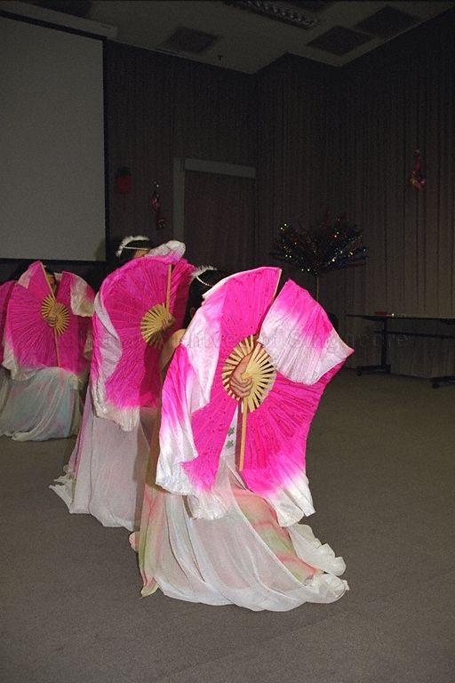 Chinese fan dance performance at Gongxi Raya Celebration at Government Press Centre, Ministry of Information and the Arts, Port of Singapore Authority (PSA) Building. In 2000, Hari Raya Puasa was on 8 Jan and Chinese New Year was on 5 Feb.