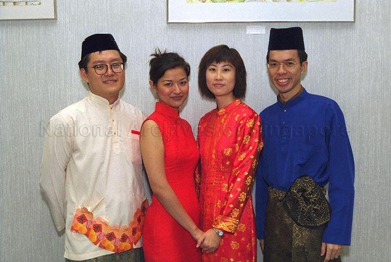 Ladies in Chinese cheongsam and men in Malay outfits at Gongxi Raya Celebration at Government Press Centre, Ministry of Information and the Arts, Port of Singapore Authority (PSA) Building. In 2000, Hari Raya Puasa was on 8 Jan and Chinese New Year was on 5 Feb.