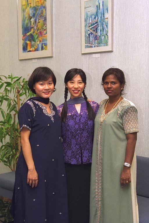 Ladies in Indian and Malay (centre) dress at Gongxi Raya Celebration at Government Press Centre, Ministry of Information and the Arts, Port of Singapore Authority (PSA) Building. In 2000, Hari Raya Puasa was on 8 Jan and Chinese New Year was on 5 Feb.
