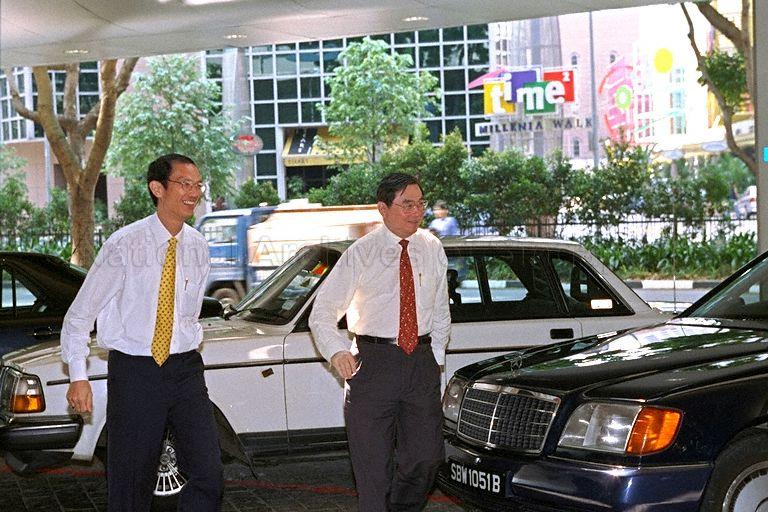 Senior Minister of State for Education Peter Chen (right) and another guest arriving at Suntec City Auditorium for the launch of "The Singapore Story: Memoirs of Lee Kuan Yew" (Abridged) and "The Biography of Lee Kuan Yew: A Trilogy"