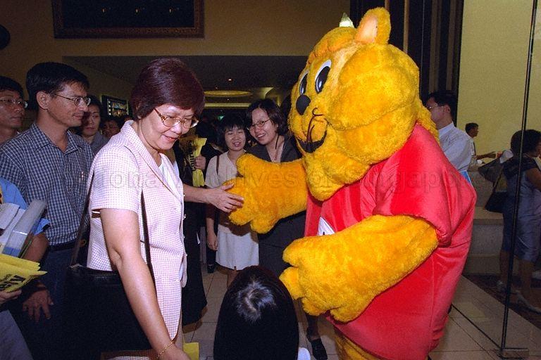 Guests exchanging greetings with Singa the Courtesy Lion, mascot for Courtesy Campaign, during launch of 22nd National Courtesy Campaign at Golden Village Grand cinema complex, Great World City