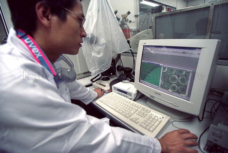 Institute of Materials Research and Engineering (IMRE) staff at work in the new premises. The IMRE Building at 3 Research Link, National University of Singapore (NUS), was officially opened by Guest-of-Honour Minister for Trade and Industry Brigadier-General George Yeo Yong-Boon.