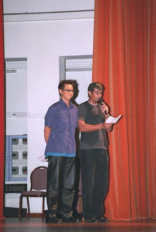 Emcee Deejays Glenn Ong and Rod Monteiro making announcements at the launch of Speak Good English Movement 2002 at Victoria Junior College Performance Theatre, Marine Vista. Guest-of-Honour Minister for Education and Second Minister for Defence Rear Admiral Teo Chee Hean was at this event