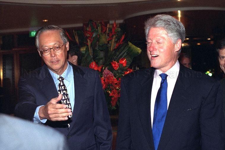 Prime Minister Goh Chok Tong and former United States President Bill Clinton having a chat as they proceed to Jade Restaurant, The Fullerton Singapore to attend a dinner hosted in honour of Mr Clinton