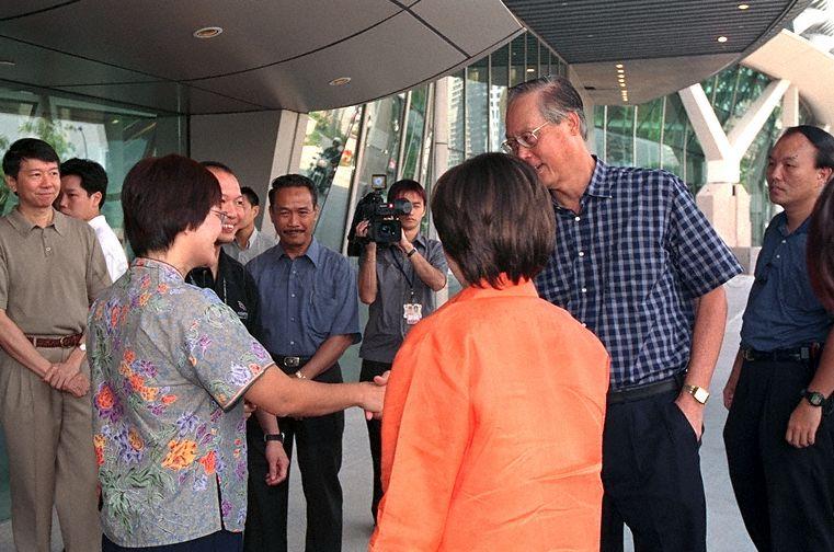 Prime Minister Goh Chok Tong and his wife, Mrs Goh (back facing camera) being welcomed upon their arrival at Esplanade - Theatres on the Bay Pictured: Senior Parliamentary Secretary for Information, Communications and the Arts Yatiman Yusof and Permanent Secretary for Information, Communications and the Arts Dr Tan Chin Nam