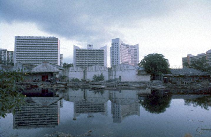 Godowns at Singapore River and hotels at Havelock Road. The hotels are (from left) Hotel Miramar, King's Hotel and Apollo Hotel.