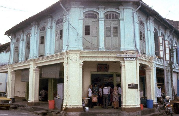 Corner shophouse, 60 Kandahar Street, at the junction of Baghdad Street selling nasi kandar. 