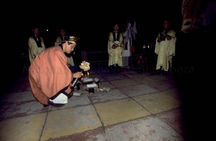 Suiside Ritual TAOIST PRIEST PREPARING FOR THE FUNERAL RITUAL