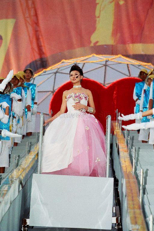 National Day Parade 2002 at National Stadium -- Close-up of local artiste Stephanie Sun Yan Zi performing the theme song 'We Will Get There'