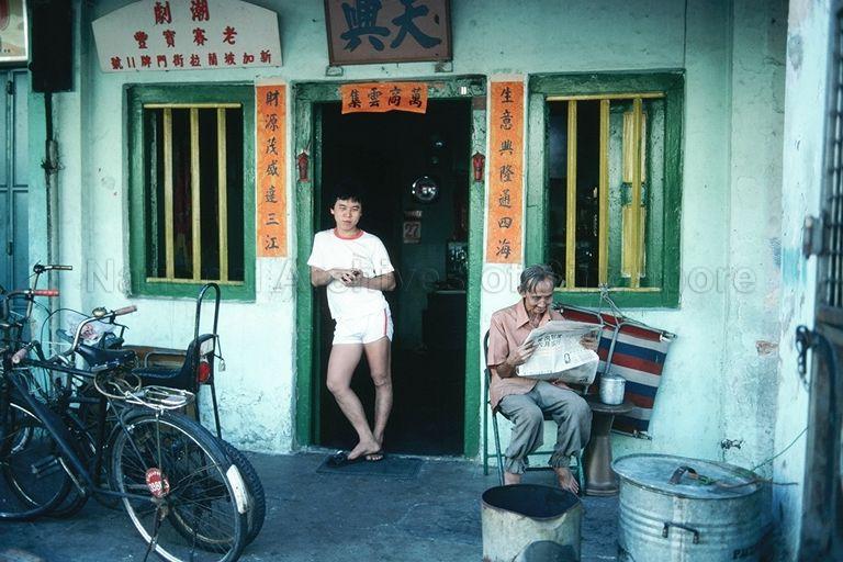 The signboard on the left of this building states that this is the headquarters for è€èµ›å®ä¸° Teochew opera troupe and the address given is å…°æ‹‰è¡—, which was the old name for Dunlop Street.