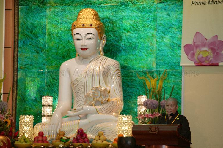 Statue of Gautama Buddha and monk giving a speech at Opening Ceremony of Tai Pei Buddhist Centre at Lavender Street. Prime Minister Goh Chok Tong and Mrs Goh are Guests of Honour at this ceremony.