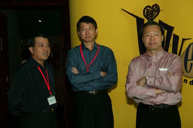 Media Development Authority Chief Executive Lim Hock Chuan (left), Permanent Secretary to Ministry of Information, Communications and the Arts (MICA) Dr Tan Chin Nam (centre) and official waiting for arrival of guest of honour Minister for Information, Communications and the Arts Dr Lee Boon Yang to Media 21 Industry Forum "Co-Creating the Future: Singapore as a Global Media City" at Zouk, Jiak Kim Street