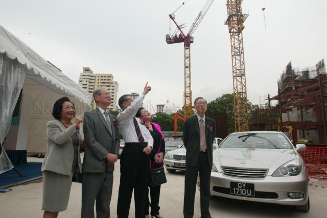 From left, Mrs and Dr Lee Seng Tee, Dr and Mrs Lee Seng Gee and Dr Lee Seng Wee of Lee Foundation at the construction site of new National Library Building during the building's foundation stone laying ceremony at Victoria Street. Guest of honour at the event was Minister for Information, Communications and the Arts Dr Lee Boon Yang. The Lee Foundation had donated S$60 million to National Library.