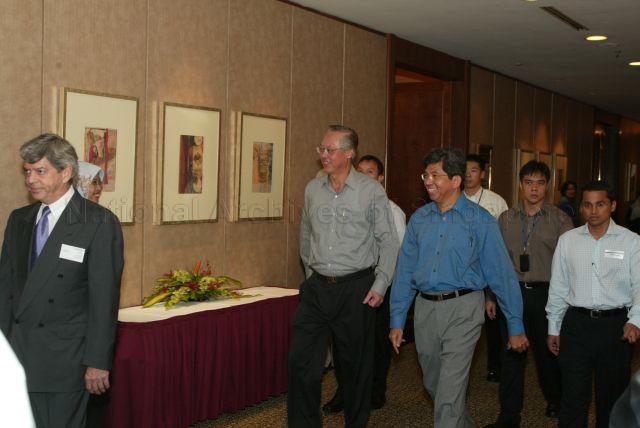 Prime Minister (PM) Goh Chok Tong accompanied by Minister
