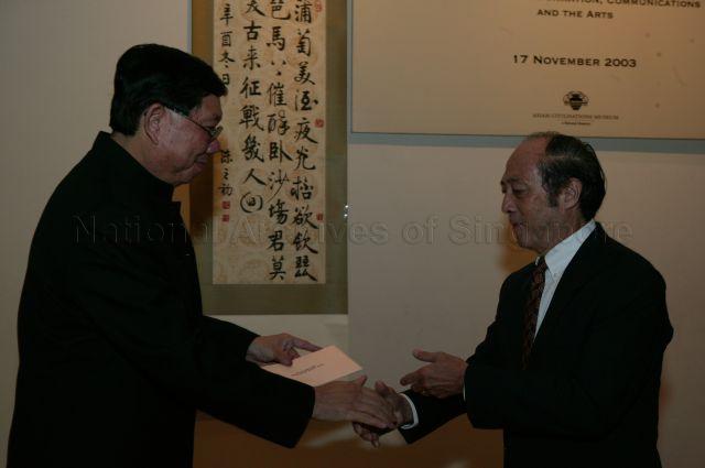 Tan Gek Gnee (left), son of the late Dr Tan Tsze Chor, and President of Singapore Art Society Khor Ean Ghee at presentation ceremony during opening of Masterworks from Xiang Xue Zhuang Collection donated by family of Dr Tan Tsze Chor at Asian Civilisations Museum, Armenian Street.