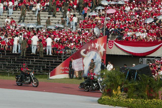 National Day Parade 2004 at the National Stadium -- Two of 14 Harley Davidson motorcycles, from the Harley Owners Group, Singapore, featured in pre-parade segment
