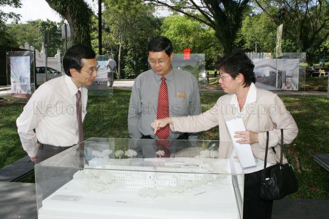 Chief Executive Officer of National Heritage Board (NHB) Mrs Lim Siok Peng (right) looking at scale model of National Museum of Singapore during foundation stone laying ceremony of National Museum of Singapore at Fort Canning Rise