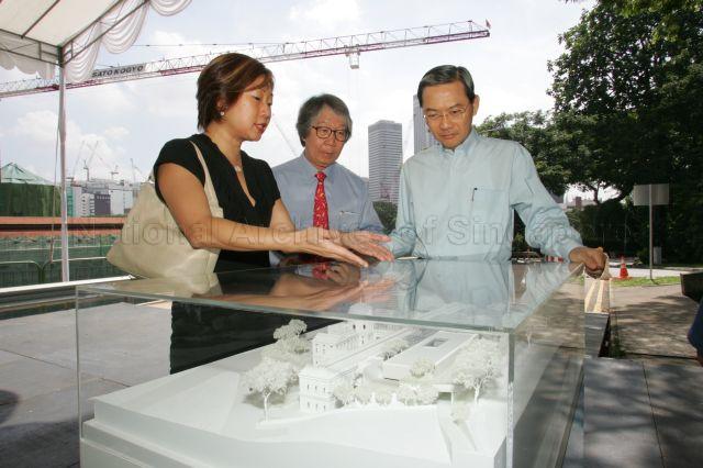 From right, Minister for Information, Communications and the Arts Dr Lee Boon Yang, Chairman of National Heritage Board (NHB) Professor Tommy Koh and Director of Singapore History Museum Ms Lee Chor Lin viewing scale model of National Museum of Singapore during the museum's foundation stone laying ceremony at Fort Canning Rise