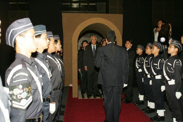 Members of Boys' Brigade welcoming Senior Minister Goh Chok Tong to fundraising dinner in support of Fort Tanjong Katong Raising History Planting Roots Project at Suntec City Convention Centre