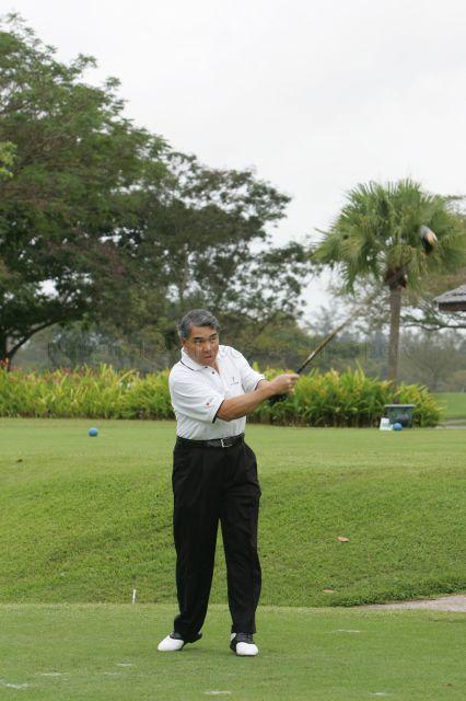 Chief Operating Officer of DBS Bank Frank Wong teeing off at second S-League Care United Golf Day at Laguna National Golf and Country Club. Guest-of-Honour at the fundraising event was Senior Minister Goh Chok Tong.