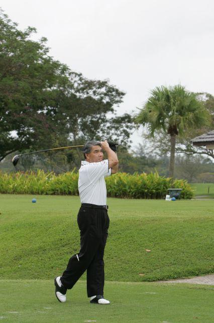 Chief Operating Officer of DBS Bank Frank Wong teeing off at second S-League Care United Golf Day at Laguna National Golf and Country Club. Guest-of-Honour at the fundraising event was Senior Minister Goh Chok Tong.