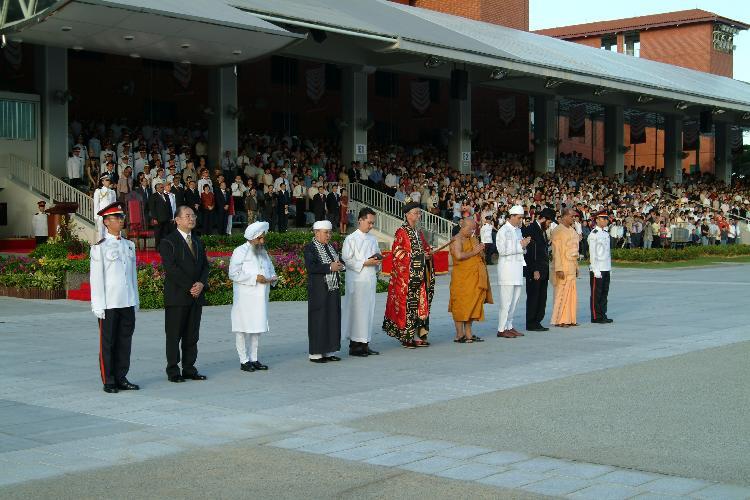 Religious leaders from the Inter-Religious Organisation of Singapore representing the nine faiths - Baha'i, Sikhism, Islam, Christianity, Taoism, Buddhism, Zoroastrianism, Judaism and Hinduism - leading the parade in observing a minute of silence in memory of the Indian Ocean tsunami victims