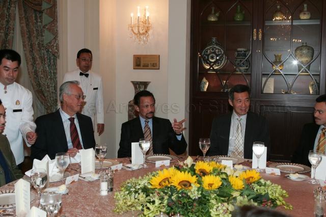 From left, Prince Abdul Malik of Brunei (partially hidden), Senior Minister Goh Chok Tong, Sultan Hassanal Bolkiah of Brunei, Prime Minister (PM) Lee Hsien Loong and Crown Prince Al-Muhtadee Billah of Brunei (partially hidden) during lunch hosted by PM Lee in honour of the Sultan of Brunei at Istana