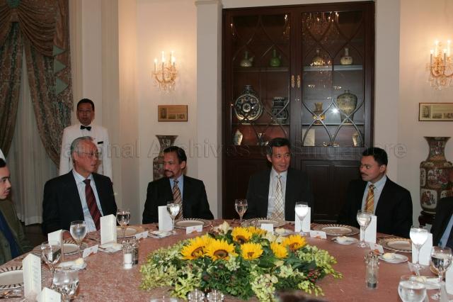 From left, Prince Abdul Malik of Brunei (partially hidden), Senior Minister Goh Chok Tong, Sultan Hassanal Bolkiah of Brunei, Prime Minister (PM) Lee Hsien Loong and Crown Prince Al-Muhtadee Billah of Brunei during lunch hosted by PM Lee in honour of the Sultan of Brunei at Istana
