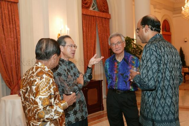 (From right) Minister for Education Tharman Shanmugaratnam, Special Adviser to Sultan and Yang Di-Pertuan of Brunei Darussalam in Prime Minister's Office and Minister of Home Affairs Pehin Dato Haji Isa bin Ibrahim, Minister for Transport Yeo Cheow Tong and former Head of Civil Service Sim Kee Boon (back to camera) talking during dinner for His Majesty Sultan Haji Hassanal Bolkiah Mu'izzaddin Waddaulah of Brunei hosted by President S R Nathan at Istana. Accompanied by his wife and family, the Sultan was in Singapore to receive an honorary Doctor of Laws degree from National University of Singapore (NUS) for his achievements in leading his country and his outstanding contributions to Singapore-Brunei relations.