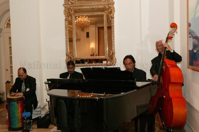 A quartet performing at dinner for His Majesty Sultan Haji Hassanal Bolkiah Mu'izzaddin Waddaulah of Brunei hosted by President S R Nathan in Istana. The Sultan, accompanied by his wife and family, was in Singapore to receive an honorary Doctor of Laws degree from National University of Singapore (NUS) for his achievements in leading his country and his outstanding contributions to Singapore-Brunei relations.